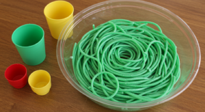 How do you make green spaghetti sensory play?