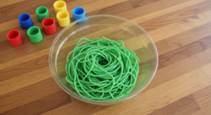 How do you make green spaghetti sensory play?