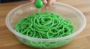 How do you make green spaghetti sensory play?